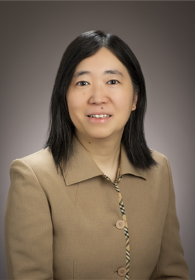 Yang Liu smiles at the camera