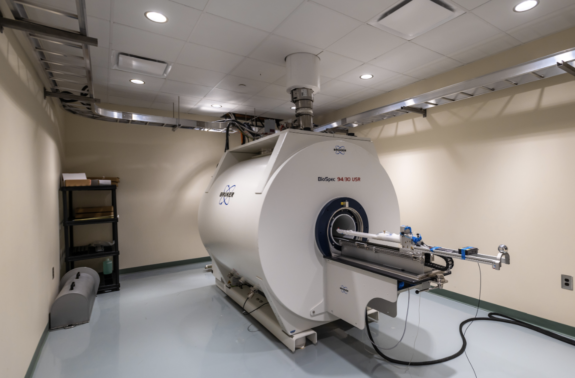 A large MRI machine in a white room.