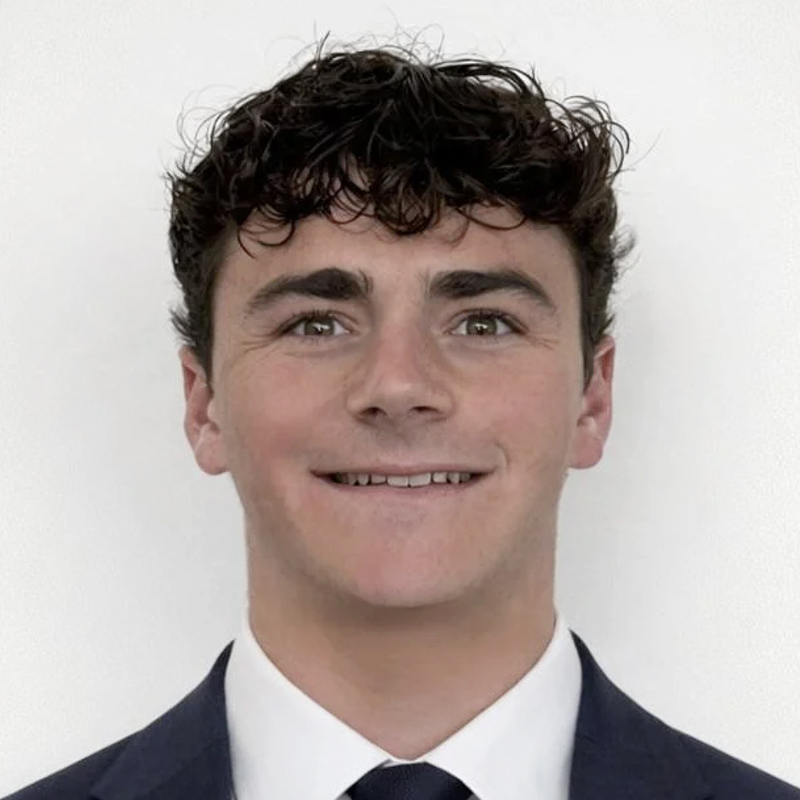 A student with a suit and tie