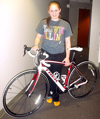 Bioengineering sophomore Grace Deetjen shows off her new bike, which she says she nicknamed &quot; 'Phoenix' for the healing that it brings and for its lightness.&quot;