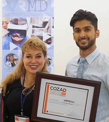 Bioengineering senior Asif Bhatti (right) developed the VR MD technology in collaboration with Christie Clinic Doctor Allison Jones (left) and Industrial and Enterprise Systems Engineering graduate student Ramkumar Komanduri