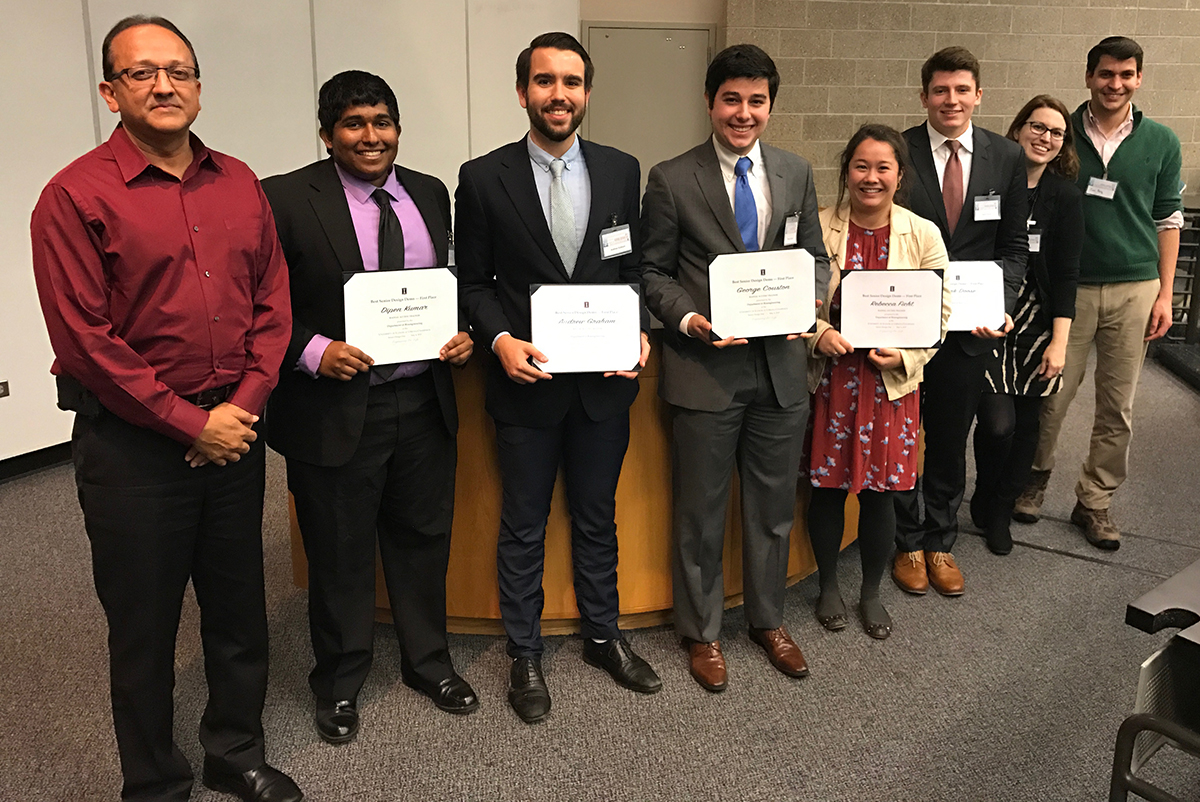 1st place Senior Design Demo winner Radial Access Trainer
Pictured (left to right): BioE Head Rashid Bashir; students Dipen Kumar, Andrew Graham, George Couston, Rebecca Ficht, Mark Doose; Senior Design Course Director Jenny Amos, and Course Teaching Assistant Ian Berg.