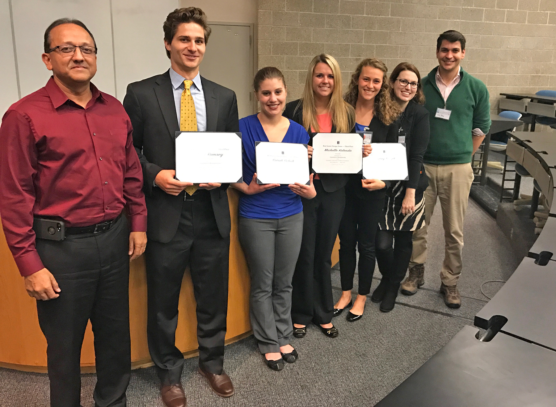 3rd place Senior Design Demo winner Sylight
Pictured (left to right) BioE Head Rashid Bashir; students Matt Ramsey, Sarah Schuh, Michelle Kalenda, and Audrey Blazek; Senior Design Course Director Jenny Amos and Teaching Assistant Ian Berg. 