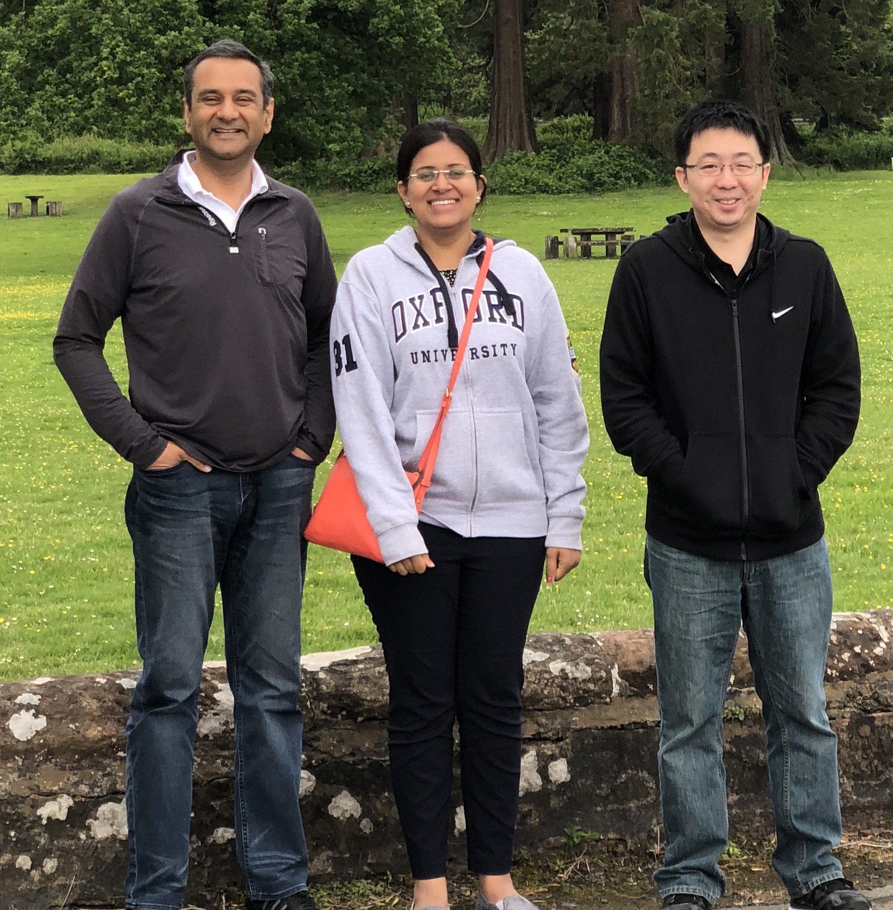 Illinois Founder Professor Rohit Bhargava (left) and Bioengineering graduate students Shachi Mittal (center) and Kevin Yeh have developed a novel imaging method (an infra-red microscope and artificial intelligence algorithms) that simultaneously sub-types cancer cells and the tumor microenvironment. They presented this technology and results at the International Society of Clinical Spectroscopy SPEC 2018 conference in Glasgow in June.