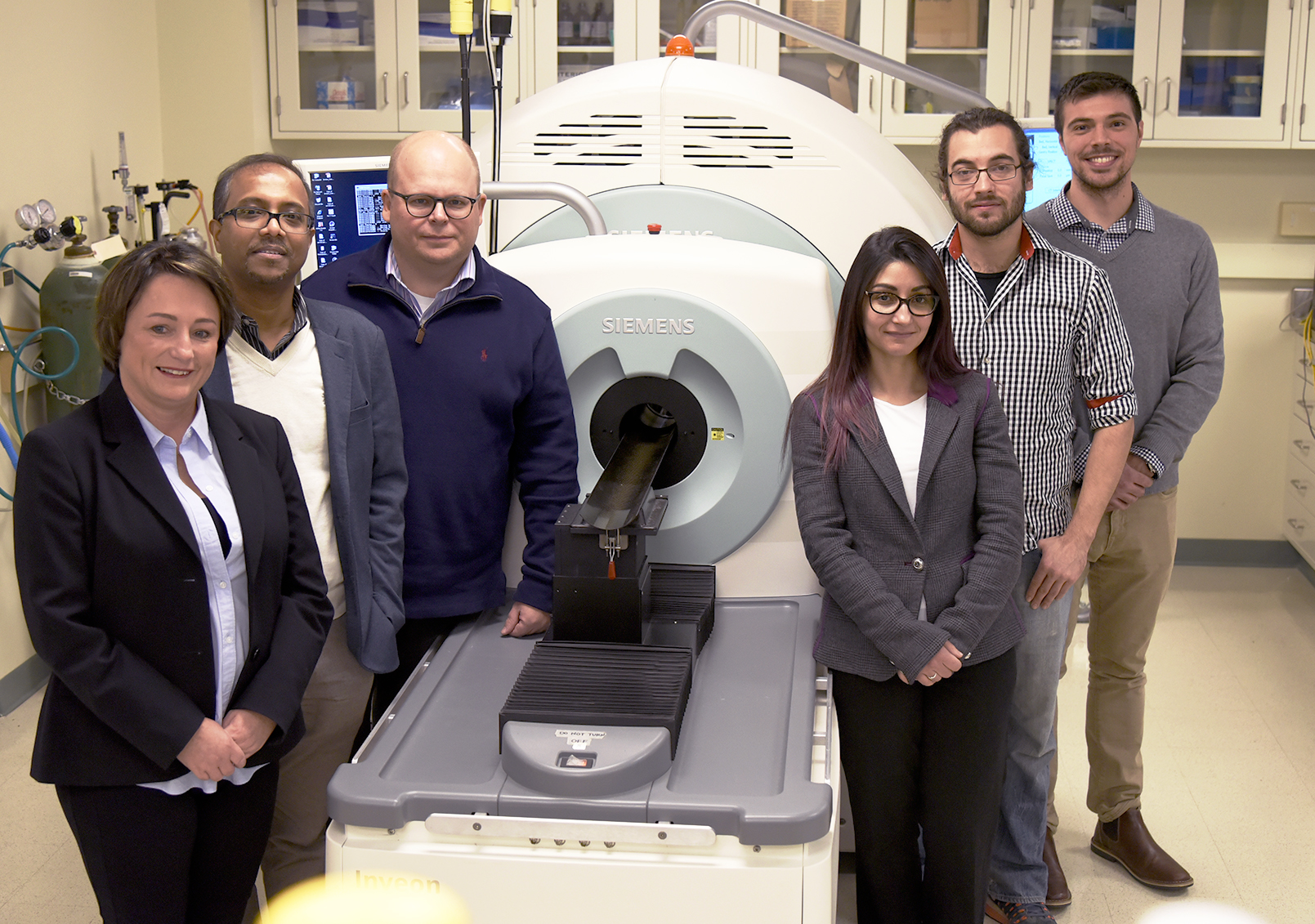 Members of the research team are pictured in the Molecular Imaging Lab at the Beckman Institute: from left, Iwona T. Dobrucka, Dipanjan Pan, Wawrzyniec Dobrucki, Jamila Hedhli, Aaron Schwartz-Duval, and Christian J. Konopka.