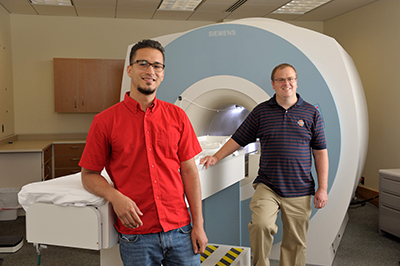 Jorge Maldonado and Prof. Brad Sutton in the MRI lab.