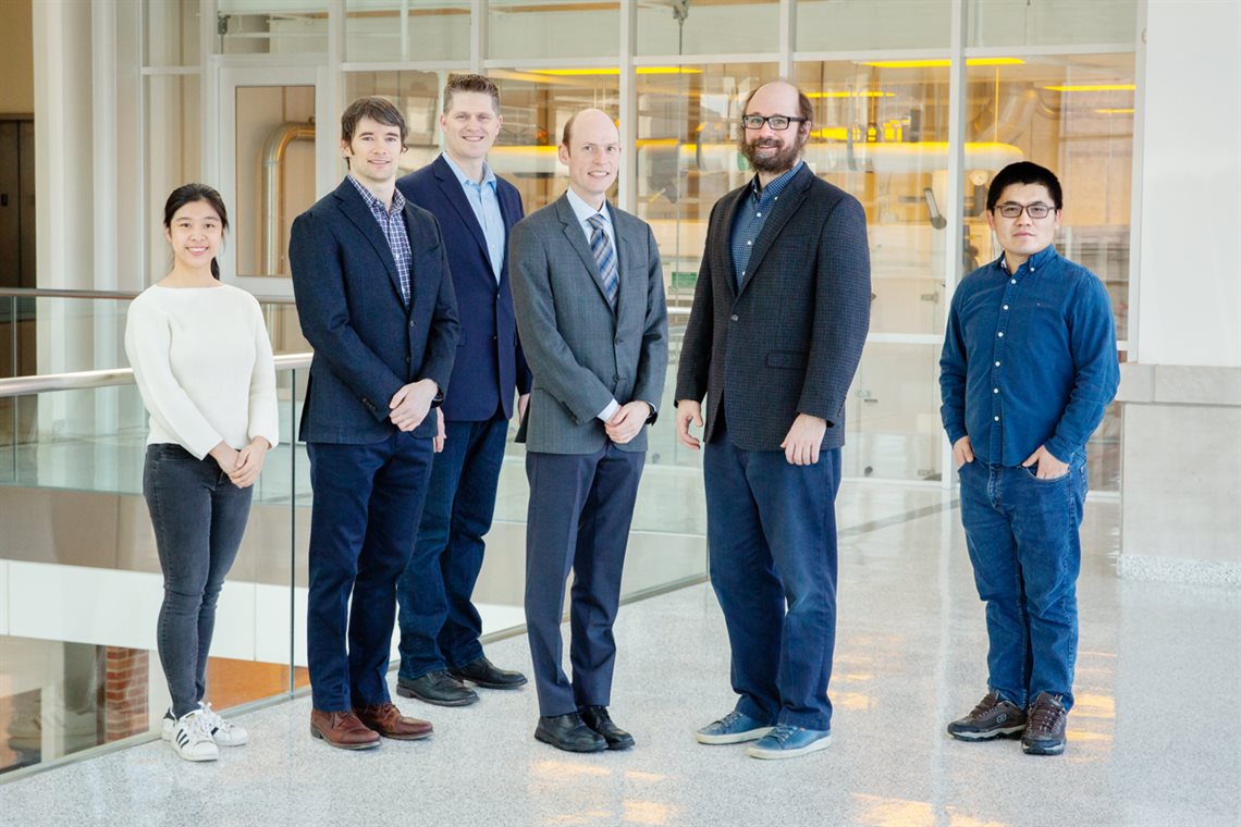 Xiaohui Zhang, left, Andrew Smith, Kelly Swanson, Erik Nelson, Mark Anastasio and Junlong Geng are part of a team working to clarify the relationship between obesity and inflammation while on the hunt for obesity-fighting drug therapies.Photo by L. Brian Stauffer