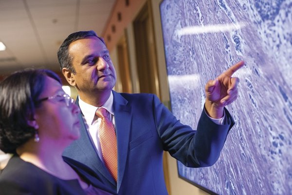 Bioengineering professor Rohit Bhargava and Dr.Georgina Cheng, a cancer surgeon at Carle Cancer Institute Urbana.