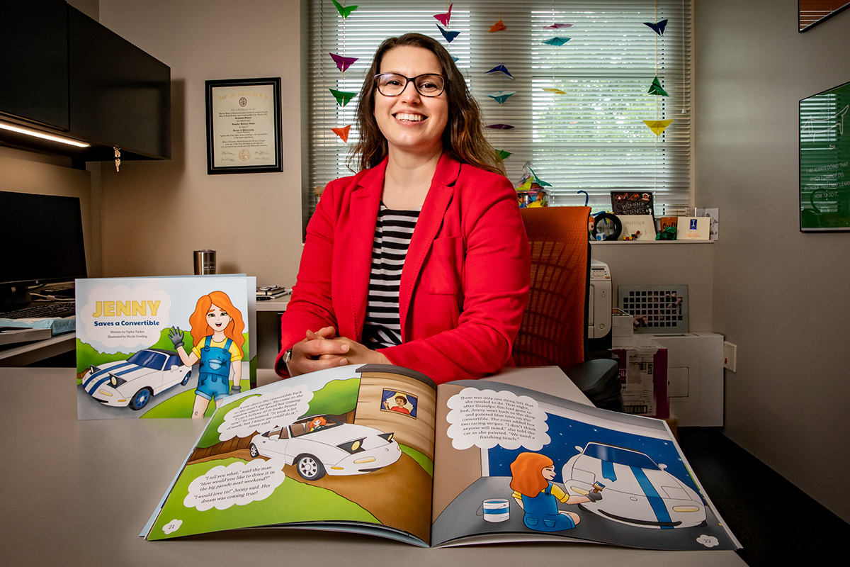 Bioengineering professor Jennifer Amos created a program in which students write and illustrate children&rsquo;s books with science, technology, engineering and mathematics themes. &ldquo;Jenny Saves a Convertible,&rdquo; the first book from the program to be published, teaches third-grade students the nuts and bolts of automotive design and engineering. Photo by Fred Zwicky