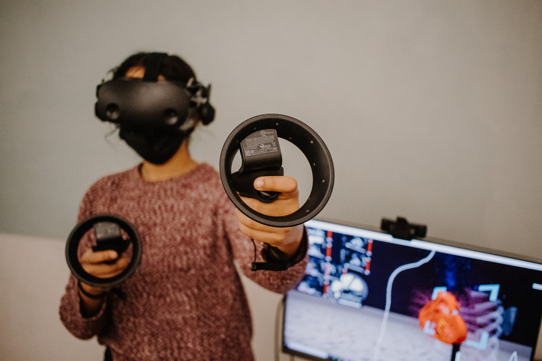 biomedical engineering students use a virtual reality headset to learn about the human body