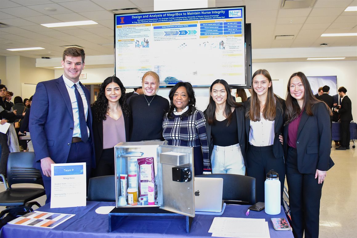 Left to right: Students Chase Hari, Erin Kinaci, Madison Louis, project sponsor Frantrice McMillan-Riley, students Mia&nbsp;Takekawa, Claire Kawiecki, and Emma&nbsp;Juffernbruch at the capstone symposium.