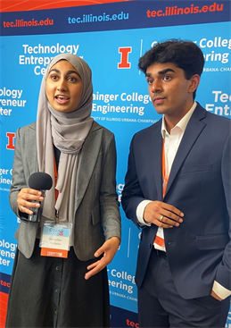 From left: Ayesha&amp;nbsp;Kazi with teammate Ammaz Khalid being interviewed at the 2022 Cozad New Venture Challenge.