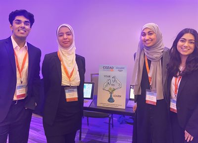 From left: Ammaz Khalid, Mona&amp;nbsp;Jawad, Ayesha Kazi, and Hamnah Razzak showcasing ASL Aspire at the 2022 Cozad New Venture Challenge Demo Day. &amp;nbsp;